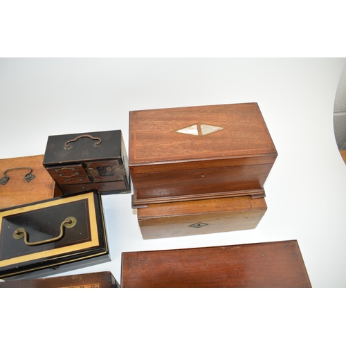 381 - A good collection of boxes and tins to include inlaid examples and others (Qty).