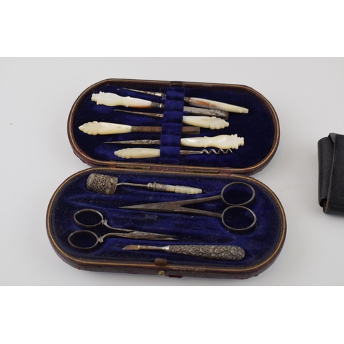 386 - Four antique sewing accessories cases and pouches with contents. (4)