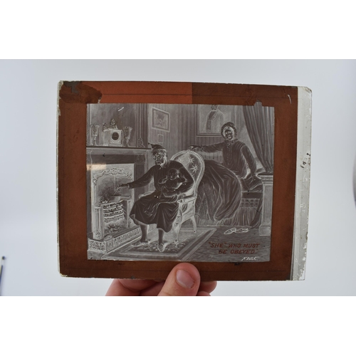 387 - A collection of glass lantern slides to include 'All Good Comes From Above' by F Volck, family photo... 