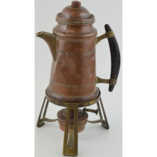 389 - An early 20th century Arts and Crafts spirit kettle with horn handle, marked 'DRGM', probably contin... 