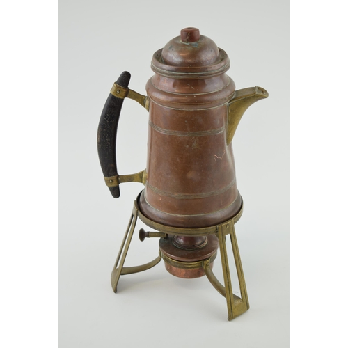 389 - An early 20th century Arts and Crafts spirit kettle with horn handle, marked 'DRGM', probably contin... 