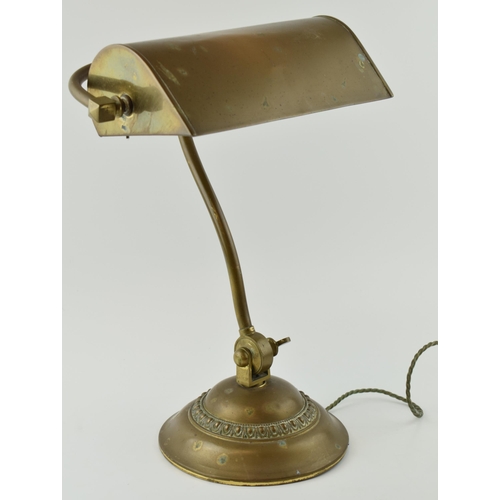 419 - Early 20th century brass 'Bankers Lamp', Height 42cm. Diameter of base. 18.5cm.