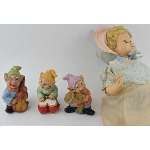 453 - Vintage doll, Made in England c1950s. Moving eyes and period clothing, with a trio of vintage terrac... 