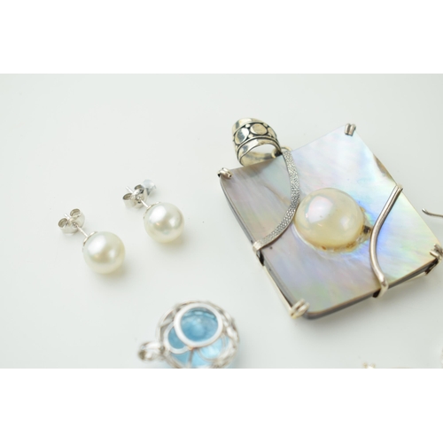 528 - A pair of 9ct (stamped 10k) gold earrings with pearl-like stones, with a collection of silver jewell... 