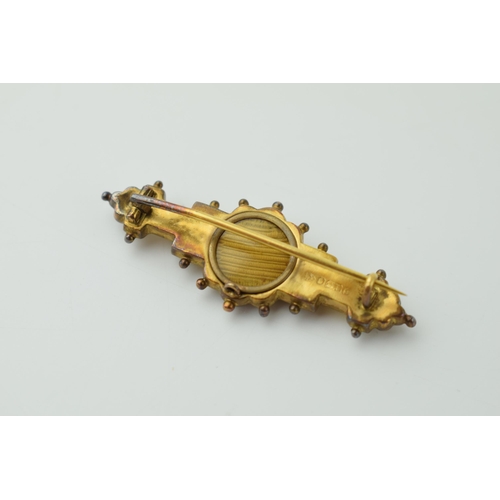 530 - 9ct yellow gold mourning brooch, set with paste stones, steel pin, 2.9g.