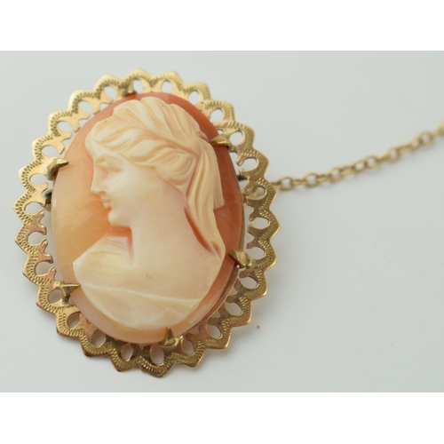 531 - 9ct gold cased cameo brooch with a female profile, metal pin and chain, 4.3g.