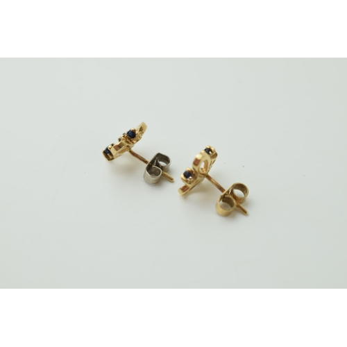 532 - 9ct gold pair of earrings, set sapphires, 1.4g, with a later white metal back.