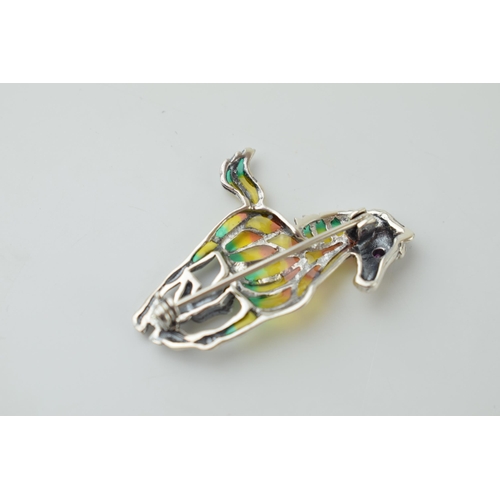 538 - Sterling silver brooch in the form of a running horse, with gem-set eye, 4.8g, 40mm tall.