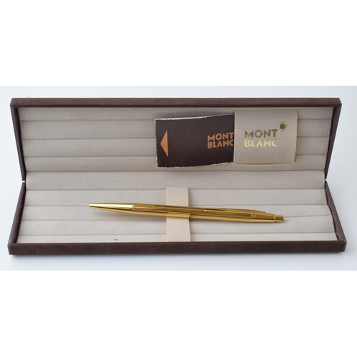 543 - Montblanc Gold Tone Ballpoint Pen, in excellent condition, in original box, guarantee, writing.