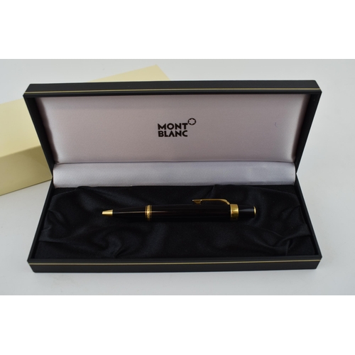 544C - Montblanc Boheme ballpoint pen, 11cm long, black resin with gold coloured fittings, serial XY1023485... 