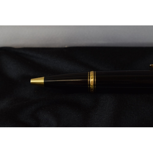 544C - Montblanc Boheme ballpoint pen, 11cm long, black resin with gold coloured fittings, serial XY1023485... 