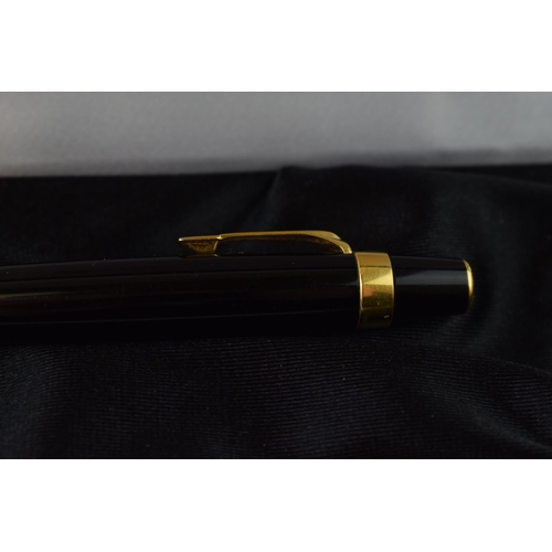 544C - Montblanc Boheme ballpoint pen, 11cm long, black resin with gold coloured fittings, serial XY1023485... 