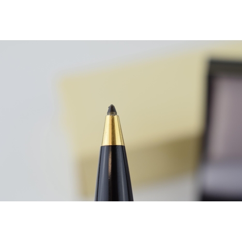 544C - Montblanc Boheme ballpoint pen, 11cm long, black resin with gold coloured fittings, serial XY1023485... 