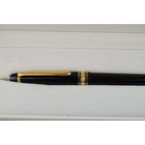 544D - Montblanc Meisterstuck fountain pen, bi-color rhodium and 14ct gold nib, black resin with gold colou... 