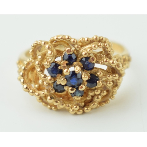 1 - 9ct gold ladies dress ring, set sapphires, 3.4g, size M.