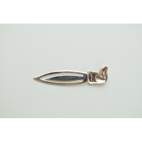 105 - Contemporary silver bookmark with a dogs head finial, 5cm long.