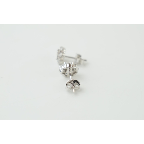 11 - 9ct white gold diamond earrings, flowers head form,  circa combined 0.25ct of diamond, 1.8g (2).