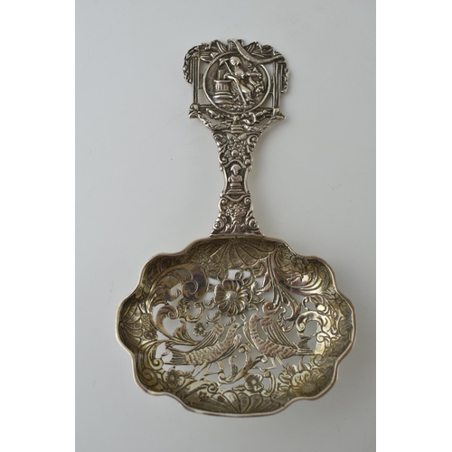 115 - Ornate silver sifter spoon, silver 930, with Sheffield 1906 import marks, 63.5g, 15cm tall.