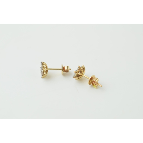 12 - 9ct gold diamond earrings, flowers head form, circa 0.1ct of diamond combined (2), 1.2g.