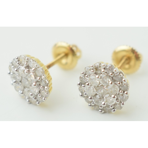 14 - 9ct gold pair of earrings, flower head form, set with diamonds, 2.5g, circa 0.01ct largest stone (2)... 