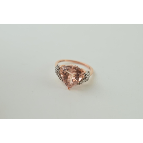 18 - 9ct rose gold ring, set diamonds in shoulder, central semi-precious, 3.1g, size O.