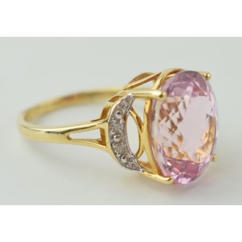 19 - 9ct rose gold ladies dress ring, 4.1g gross weight, diamond set shoulders, semi precious to centre, ... 