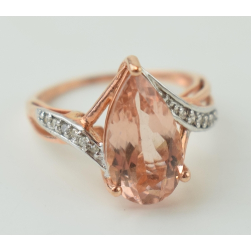 20 - 9ct rose gold ladies dress ring, diamond set shoulders with central gemstone, 3.3g, size P.