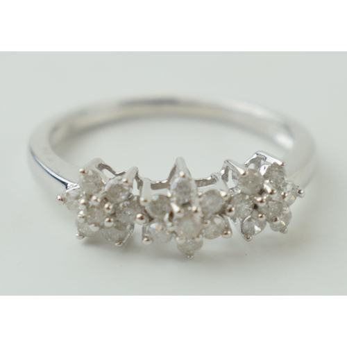 21 - 9ct white gold diamond ring, three diamond flowers, 2.4g, size P.