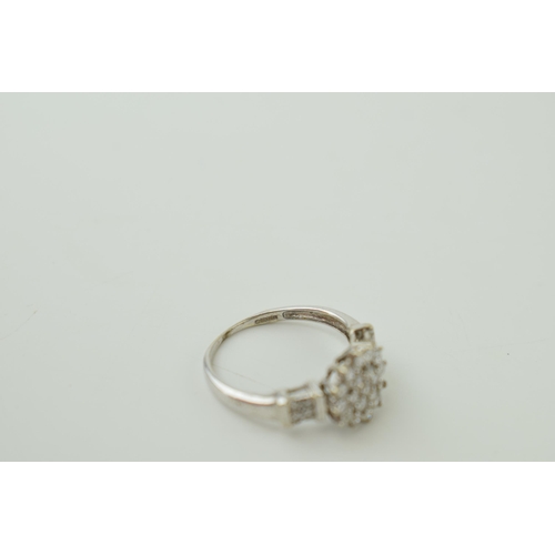 22 - 9ct white gold ring set with diamonds, floral style, 2.3g, size M.