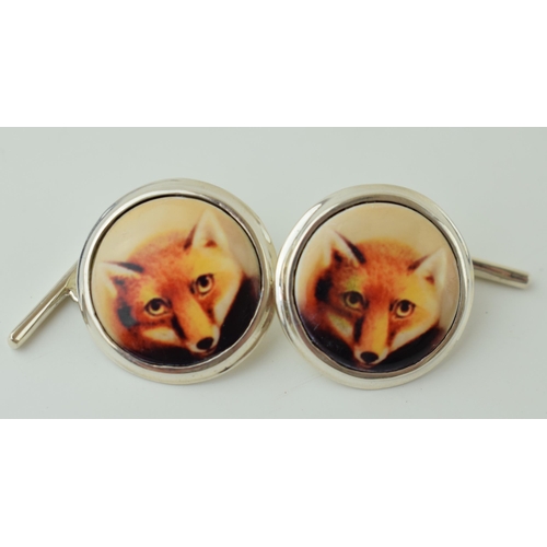 53 - Contemporary silver cufflinks with enamelled decoration of fox heads, 8.8g (2).