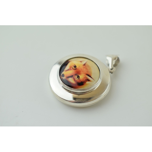 55 - Contemporary silver locket with fox head enamelled decoration, 13.5g, 33mm wide.