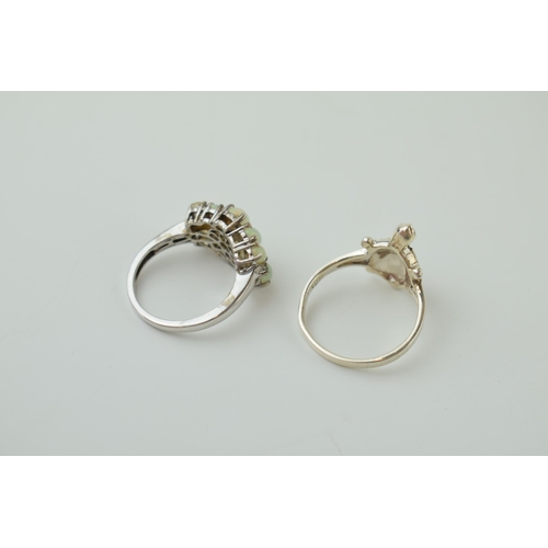 62 - A pair of silver 925 rings to include a tortoise, size R, and an opal set ring, size N/O, combined 6... 