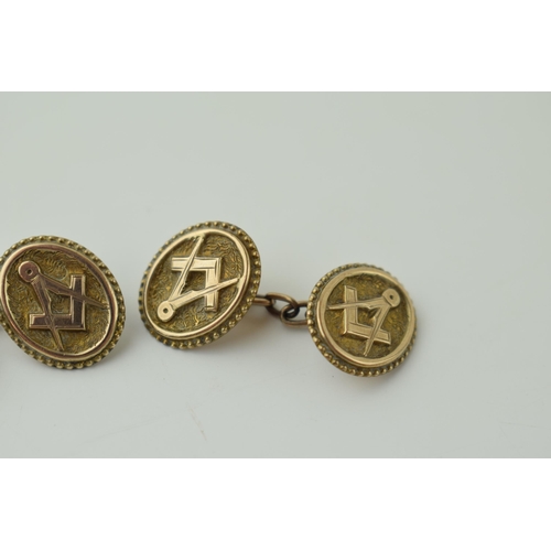 66 - A pair of gilt metal masonic cufflinks (2).