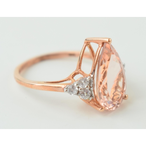 7 - 9ct gold rose gold ring set with semi-precious stones, 2.7g, size M.