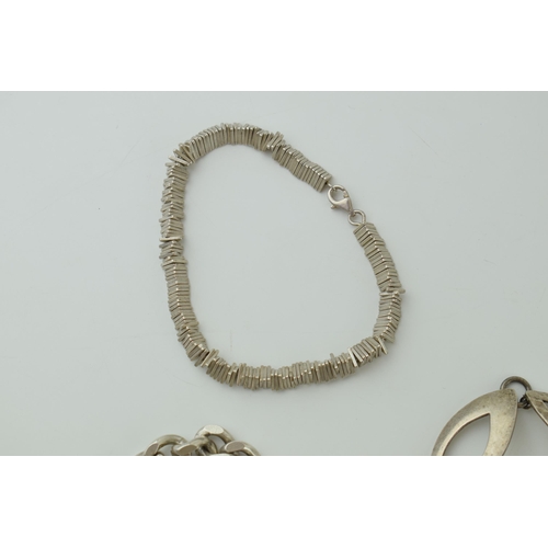 75 - A trio of silver bracelets of varying style and sizes, 80g (3).