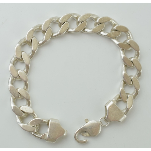 76 - Heavy silver curb link bracelet, 51g, 21cm long.