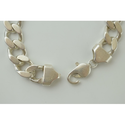 76 - Heavy silver curb link bracelet, 51g, 21cm long.