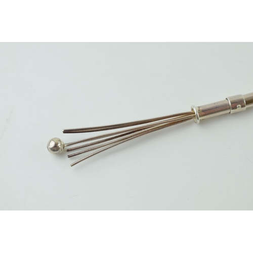 84 - Silver (tests as) retractable cocktail stirrer with working mechanism, 12cm long when extended.