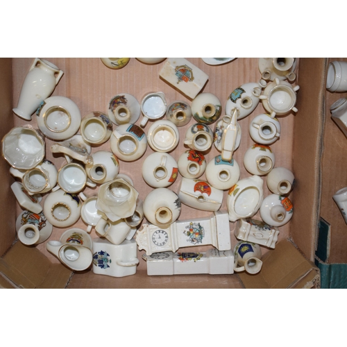 120 - A large and interesting collection of crested china to include vehicles such as Arcadian Harpenden, ... 