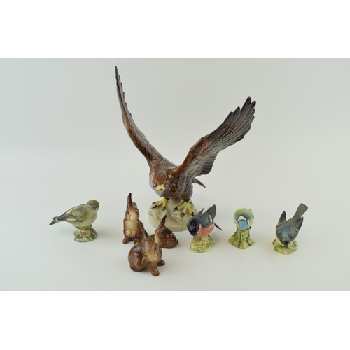 154 - Beswick to include three rabbits, a golden eagle (Af) and 4 small birds (8).