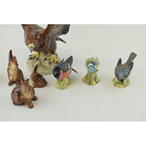 154 - Beswick to include three rabbits, a golden eagle (Af) and 4 small birds (8).