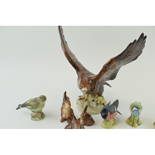 154 - Beswick to include three rabbits, a golden eagle (Af) and 4 small birds (8).