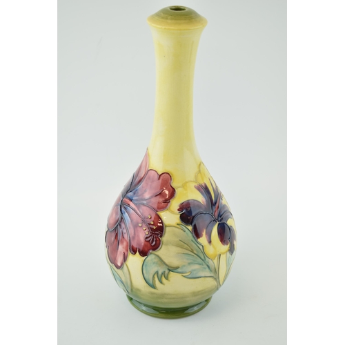 21 - Moorcroft lamp base in the Hibiscus pattern. signed WM in pen to base with 'By Appointment W. Moorcr... 