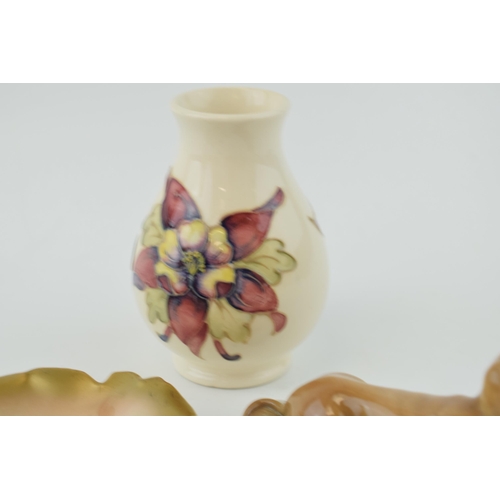 22 - A Moorcroft clematis vase on magnolia, 10cm, with a Royal Worcester pink rose pin dish (chipped) and... 