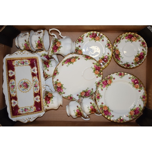 233 - Royal Albert Old Country Roses to include a 6 cups, 6 saucers, 5 side plates, larger plates, a cake ... 