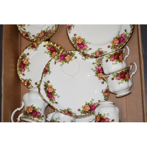 233 - Royal Albert Old Country Roses to include a 6 cups, 6 saucers, 5 side plates, larger plates, a cake ... 