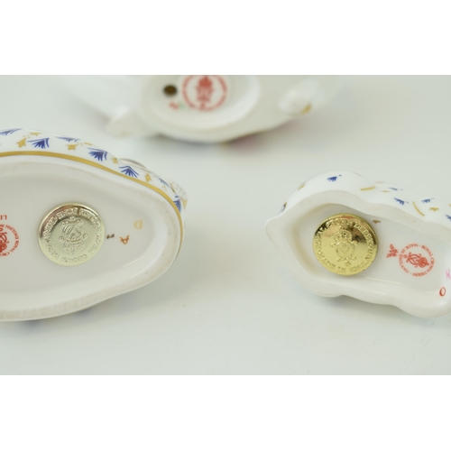 26 - Royal Crown Derby paperweights to include an Imari Pig together with two Rabbits, all first quality ... 