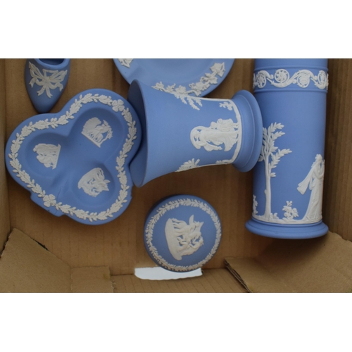 262 - Wedgwood Jasperware to include a cylindrical vase, pin dishes, a shoe, vases and others (10).