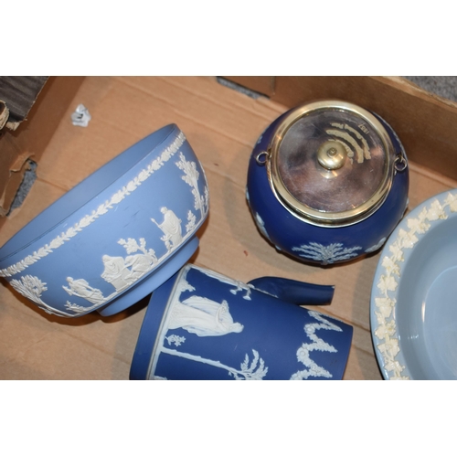 266 - Wedgwood to include a Jasperware sacrifice bowl, a dip blue coffee pot (damaged), a biscuit barrel w... 