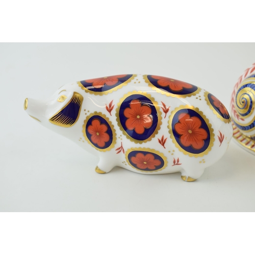 27 - Royal Crown Derby paperweights in the form of an imari pig and a garden snail, both first quality, c... 